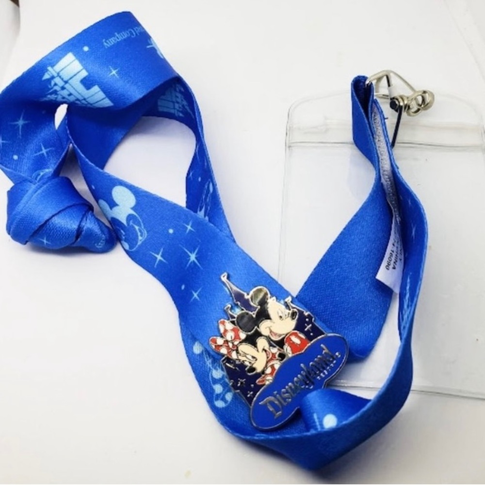 Disney Blue Lanyard with Disneyland Pin.  Authentic Park Merchandise.